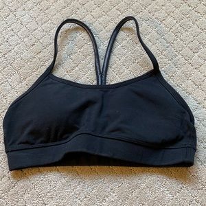Lululemon yoga sports bra top. Black. Size 4. With liners. Gently used.